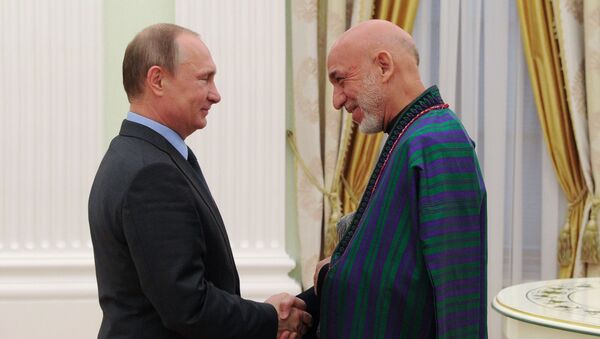 Президент России Владимир Путин и экс-президент Афганистана Хамид Карзай на встрече в Кремле - اسپوتنیک افغانستان  