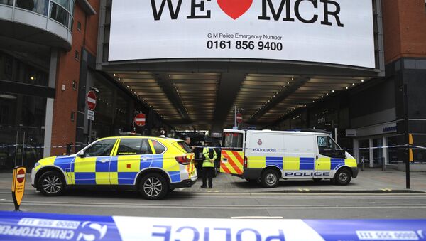Police evacuate the Arndale shopping centre, in Manchester, England Tuesday May 23, 2017, the day after an apparent suicide bomber attacked an Ariana Grande concert as it ended Monday night, killing over a dozen of people among a panicked crowd of young concertgoers. - اسپوتنیک افغانستان  
