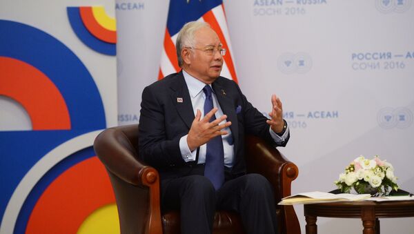 19 May 2016. Prime Minister of Malaysia Najib Tun Razak during a bilateral meeting with Russian President Vladimir Putin at Radisson Blu Resort & Congress Centre in Sochi - اسپوتنیک افغانستان  
