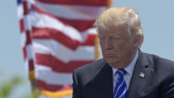 President Donald Trump attends the commencement address at the U.S. Coast Guard Academy in New London, Conn., Wednesday, May 17, 2017 - اسپوتنیک افغانستان  