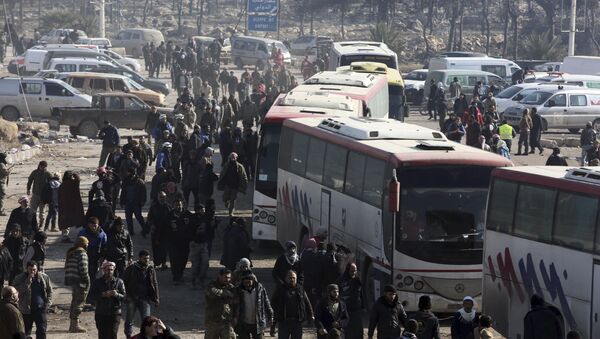 bus convoys resumed transporting residents out of the Syrian towns of Foua and Kefraya in the northwestern province of Idlib as part of an evacuation deal between the government and militants - اسپوتنیک افغانستان  