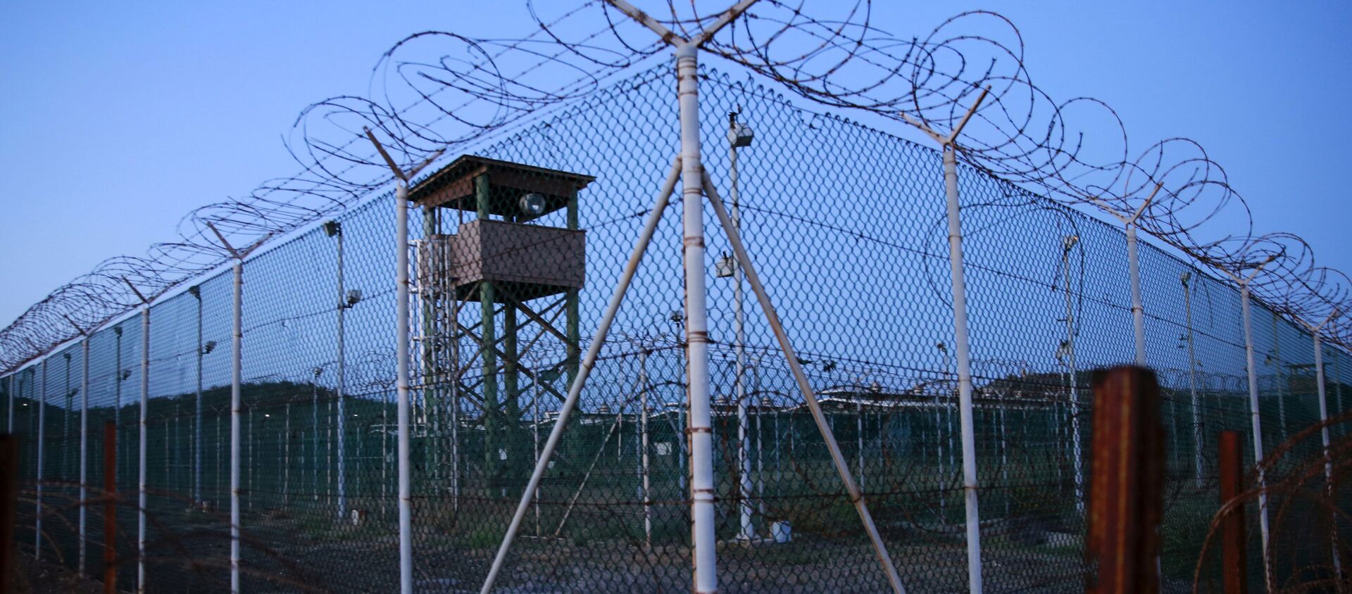Забор и сторожевая вышка тюрьмы Гуантанамо на Кубе - اسپوتنیک افغانستان  , 1920, 05.04.2021