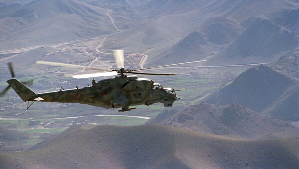 A Mi-24 helicopter on a mission in the vicinity of the Kabul-Herat road - اسپوتنیک افغانستان  