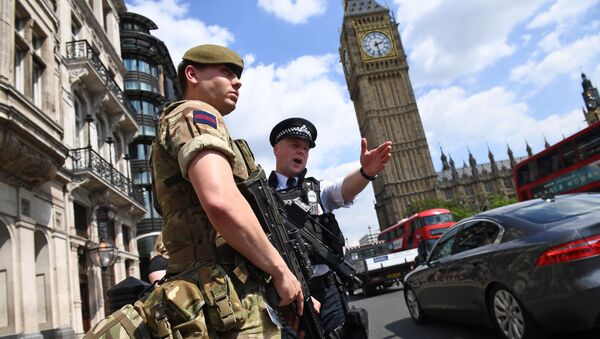 Британские полицейские и военные у здания Парламента в Лондоне - اسپوتنیک افغانستان  