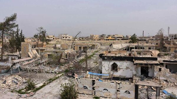 Разрушенные здания на одной из улиц города Дейр-Хафир в провинции Алеппо - اسپوتنیک افغانستان  