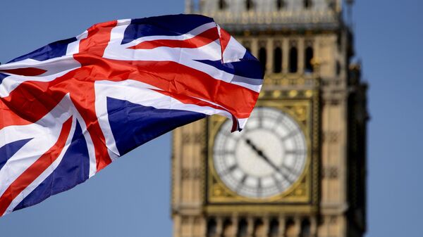 Британский флаг на фоне Биг-Бена в Лондоне // AFP / Fabrice Coffrini - اسپوتنیک افغانستان  