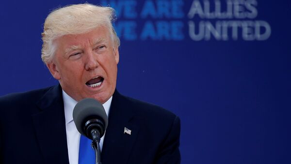 U.S. President Donald Trump delivers remarks at the start of the NATO summit at their new headquarters in Brussels, Belgium - اسپوتنیک افغانستان  