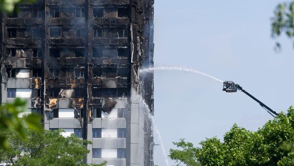 Тушение пожара в многоэтажном жилом доме на западе Лондона - اسپوتنیک افغانستان  