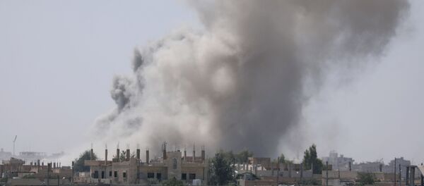Дым над юго-восточной окраиной Ракки, Сирия - اسپوتنیک افغانستان  