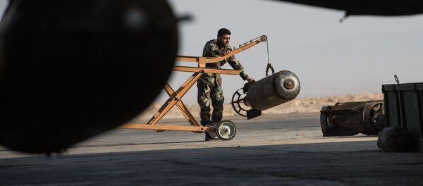 A Syrian army soldier prepares the Su-22 fighter jet for a flight at the Syrian Air Force base in Homs province. File photo A Syrian army soldier prepares the Su-22 fighter jet for a flight at the Syrian Air Force base in Homs province. File photo - اسپوتنیک افغانستان