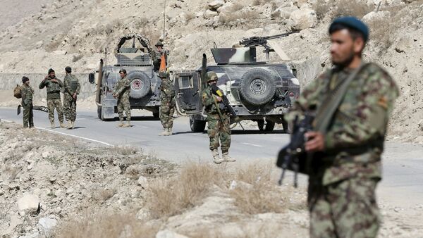 Afghan National Army (ANA) soldiers keep watch at a checkpost in Logar province, Afghanistan February 16, 2016 - اسپوتنیک افغانستان  