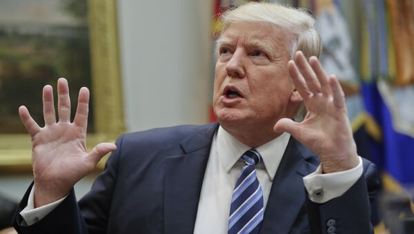 President Donald Trump gestures while speaking during a meeting in the Roosevelt Room of the White House in Washington, Monday, March 13, 2017. - اسپوتنیک افغانستان  