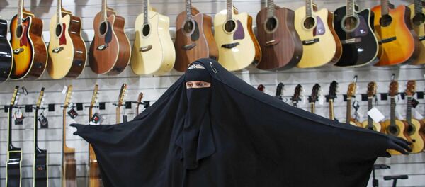 Мусульманская женщина-музыкант Gisele Marie Мусульманская женщина-музыкант Gisele Marie - اسپوتنیک افغانستان