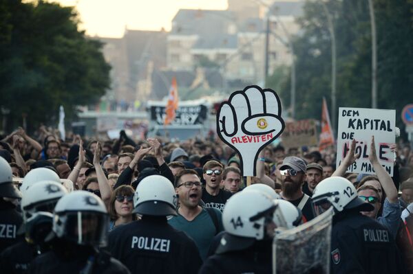 معترضان در آستانه اجلاس G20 - هامبورگ، آلمان - اسپوتنیک افغانستان  