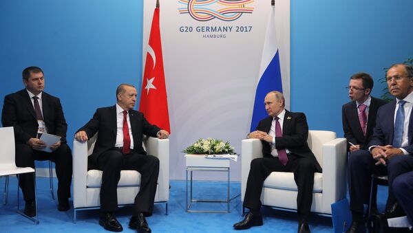 July 8, 2017. Russian President Vladimir Putin and President of Turkey Recep Tayyip Erdogan, second left, talk during their meeting on the sidelines of the G20 summit in Hamburg. Right: Russian Foreign Minister Sergei Lavrov - اسپوتنیک افغانستان  