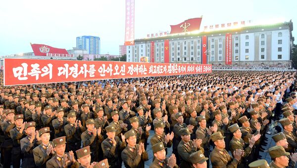 Army personnel and people gather at Kim Il Sung Square in Pyongyang July 6, 2017 to celebrate the successful test-launch of intercontinental ballistic rocket Hwasong-14. in this photo released by North Korea's Korean Central News Agency (KCNA) in Pyongyang July 7, 2017 - اسپوتنیک افغانستان  