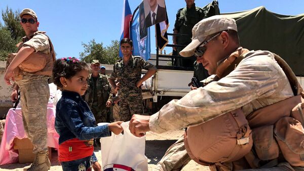 Российский центр по примирению враждующих сторон доставил гуманитарную помощь в сирийскую провинцию Кунейтра - اسپوتنیک افغانستان  
