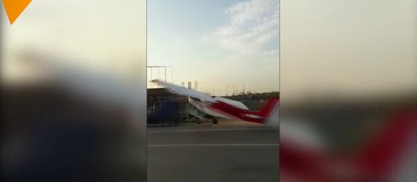Plane Bumps Into A Car - اسپوتنیک افغانستان  
