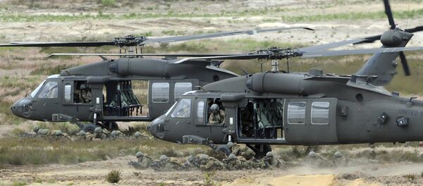 U.S. Army Black Hawk helicopters support soldiers during the NATO Noble Jump exercise on a training range near Swietoszow Zagan, Poland. Polish leaders say the country is buying Polish-made Black Hawk helicopters as it modernizes the army. U.S. Army Black Hawk helicopters support soldiers during the NATO Noble Jump exercise on a training range near Swietoszow Zagan, Poland. Polish leaders say the country is buying Polish-made Black Hawk helicopters as it modernizes the army. - اسپوتنیک افغانستان