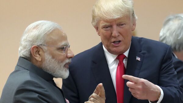 India's Prime Minister Narendra Modi, in conversation with U.S. president Donald Trump during a working session of the G20 summit in Hamburg, Germany, Saturday, July 8, 2017 - اسپوتنیک افغانستان  