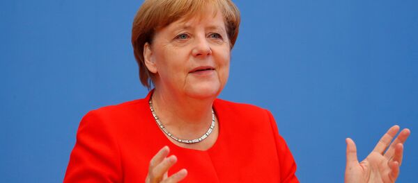 Канцлер Германии Ангела Меркель на пресс-конференции в Берлине, Германия Канцлер Германии Ангела Меркель на пресс-конференции в Берлине, Германия - اسپوتنیک افغانستان