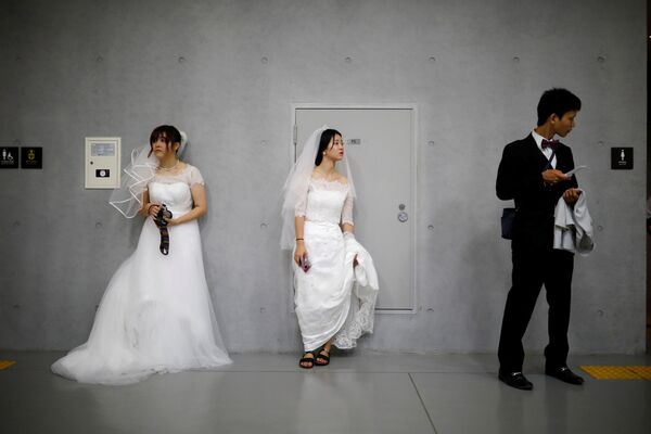 عروس و داماد در عروسی دسته جمعی - کوریای جنوبی - اسپوتنیک افغانستان  