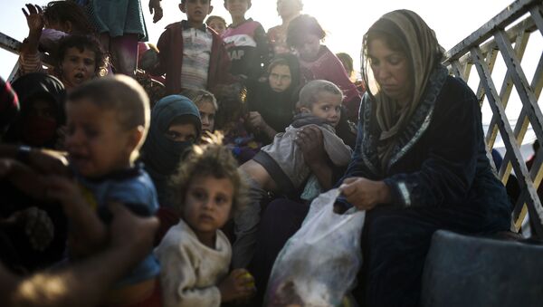 بازداشت حدود 1400 زن و کودک داعشیان خارجی در عراق - اسپوتنیک افغانستان  