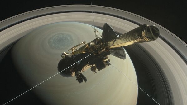 Космический аппарат NASA «Кассини» между Сатурном и его кольцами перед окончанием миссии - اسپوتنیک افغانستان  