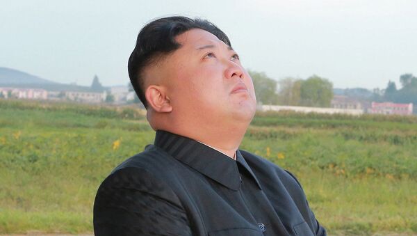 Лидер КНДР Ким Чен Ын во время запуска баллистической ракеты Hwasong-12 - اسپوتنیک افغانستان  