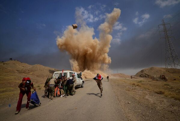 سربازان نیروی بسیج مردم در هنگام حمله الخویدجی، عراق - اسپوتنیک افغانستان  