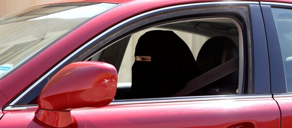 A woman drives a car in Riyadh, Saudi Arabia (File) A woman drives a car in Riyadh, Saudi Arabia (File) - اسپوتنیک افغانستان