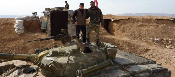 Сирийские солдаты на огневом рубеже в городе Маалюля. Сирия Сирийские солдаты на огневом рубеже в городе Маалюля. Сирия - اسپوتنیک افغانستان