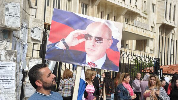 Митинг жителей Латакии в честь российского Дня народного единства в Сирии - اسپوتنیک افغانستان  