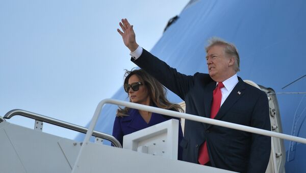 US President Donald Trump and First Lady Melania Trump board Air Force One departing from Andrews Air Force Base, Maryland on November 3, 2017, embarking on a 11-day tour of Asia - اسپوتنیک افغانستان  