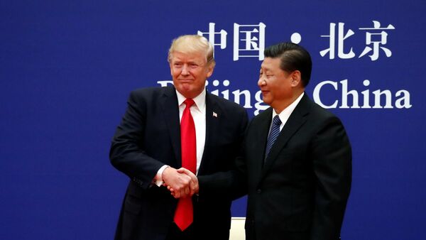 U.S. President Donald Trump and China's President Xi Jinping meet business leaders at the Great Hall of the People in Beijing, China, November 9, 2017 - اسپوتنیک افغانستان  