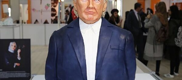 The cake bust of US President Donald Trump by Turkish confectioner Tuba Geçkil displayed at the Festival of Chocolates, Sweets and Cakes in Istanbul. - اسپوتنیک افغانستان  