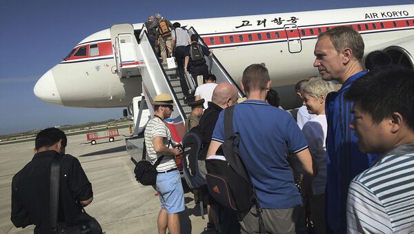 Посадка на самолет северокорейской авиакомпании Air Koryo в КНДР - اسپوتنیک افغانستان  