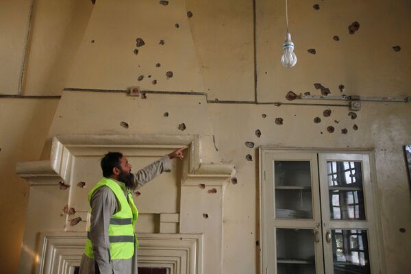 دیوار به بعد از حمله به دانشگاه کشاورزی در پیشاور پاکستان - اسپوتنیک افغانستان  
