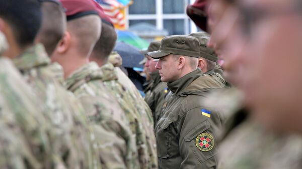 Солдаты американской и украинской армий участвуют в военных учениях на Яворовском военном полигоне во Львовской области - اسپوتنیک افغانستان  