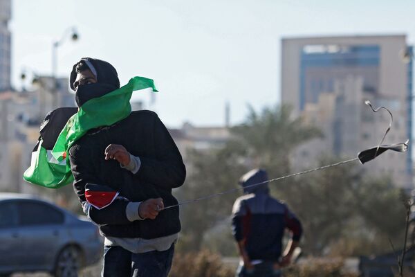 معترض در جریان درگیری ها در مرز فلسطین و اسرائیل در بیت لحم - اسپوتنیک افغانستان  