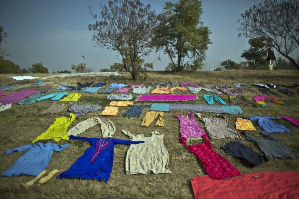 خشک کردن لباس در اسلام آباد - اسپوتنیک افغانستان  