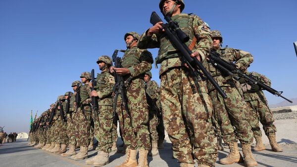 Afghan security forces attend a ceremony in Laghman province, east of Kabul, Afghanistan, Sunday, Jan. 11, 2015 - اسپوتنیک افغانستان  