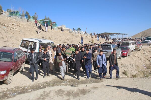 مراسم خاکسپاری قربانیان حملات تروریستی در روز 28 دسمبر در کابل - اسپوتنیک افغانستان  