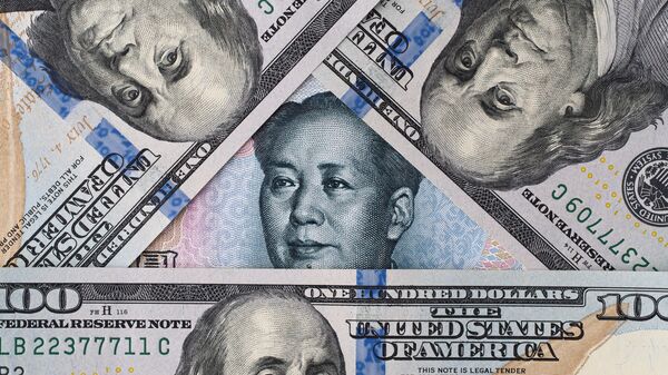 Банкноты долларов США и китайских юаней  - اسپوتنیک افغانستان  