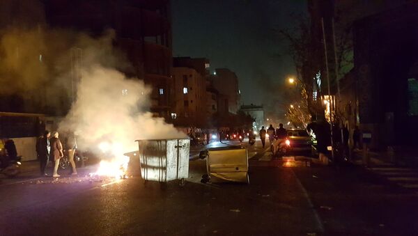 People protest in Tehran, Iran December 30, 2017 in this picture obtained from social media - اسپوتنیک افغانستان  