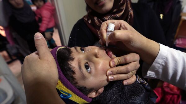Syrian refugee Mohammed Sammor, 3, receives vaccination against polio (File) - اسپوتنیک افغانستان  