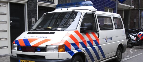 Полицейский автомобиль на улице Амстердама. Архивное фото Полицейский автомобиль на улице Амстердама. Архивное фото - اسپوتنیک افغانستان