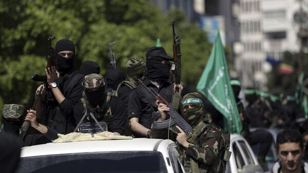 Члены палестинской группировки Хамас во время похорон Мазена Фукаха в городе Газа - اسپوتنیک افغانستان  