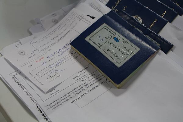تمدید پاسپورت های خانوار مهاجران افغانستانی در تهران - اسپوتنیک افغانستان  