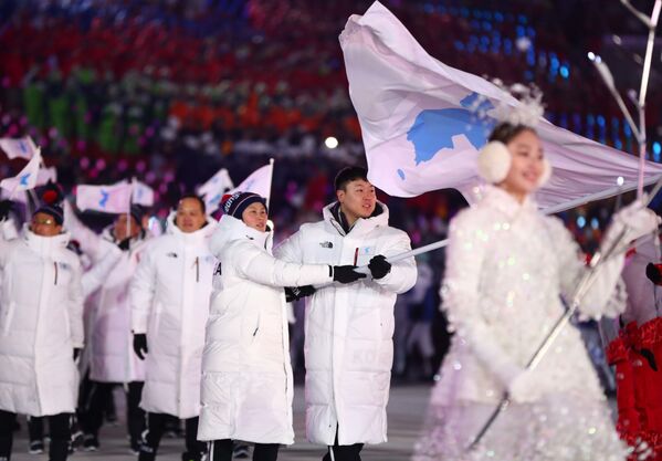 ورزشکاران دو کشور کوریای شمالی و جنوبی زیر پرچم کوریای متحد - اسپوتنیک افغانستان  
